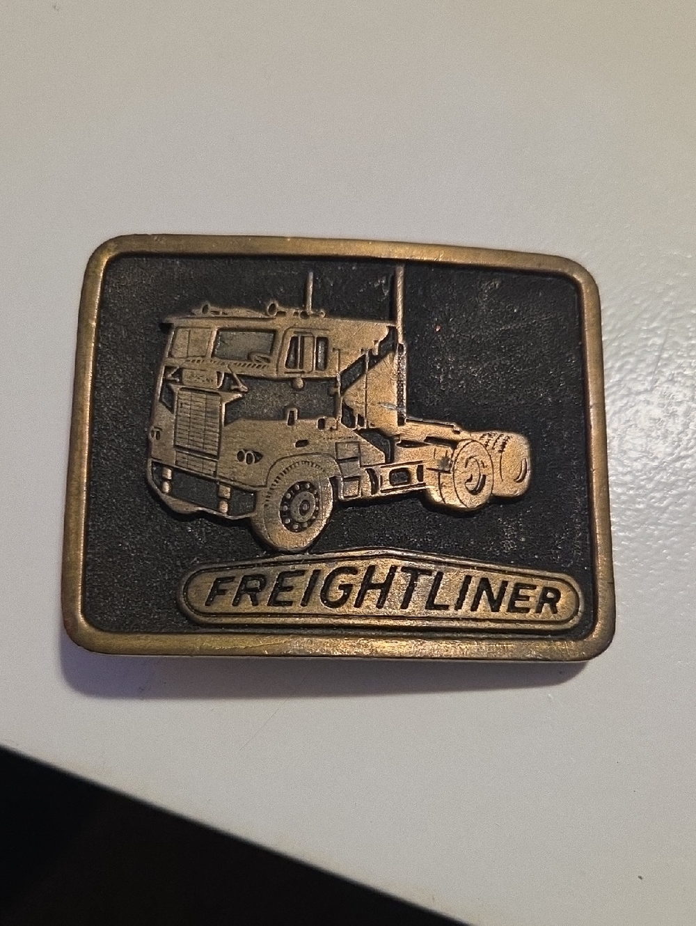 Brass-Tone Truck Belt Buckle - Black & Gold